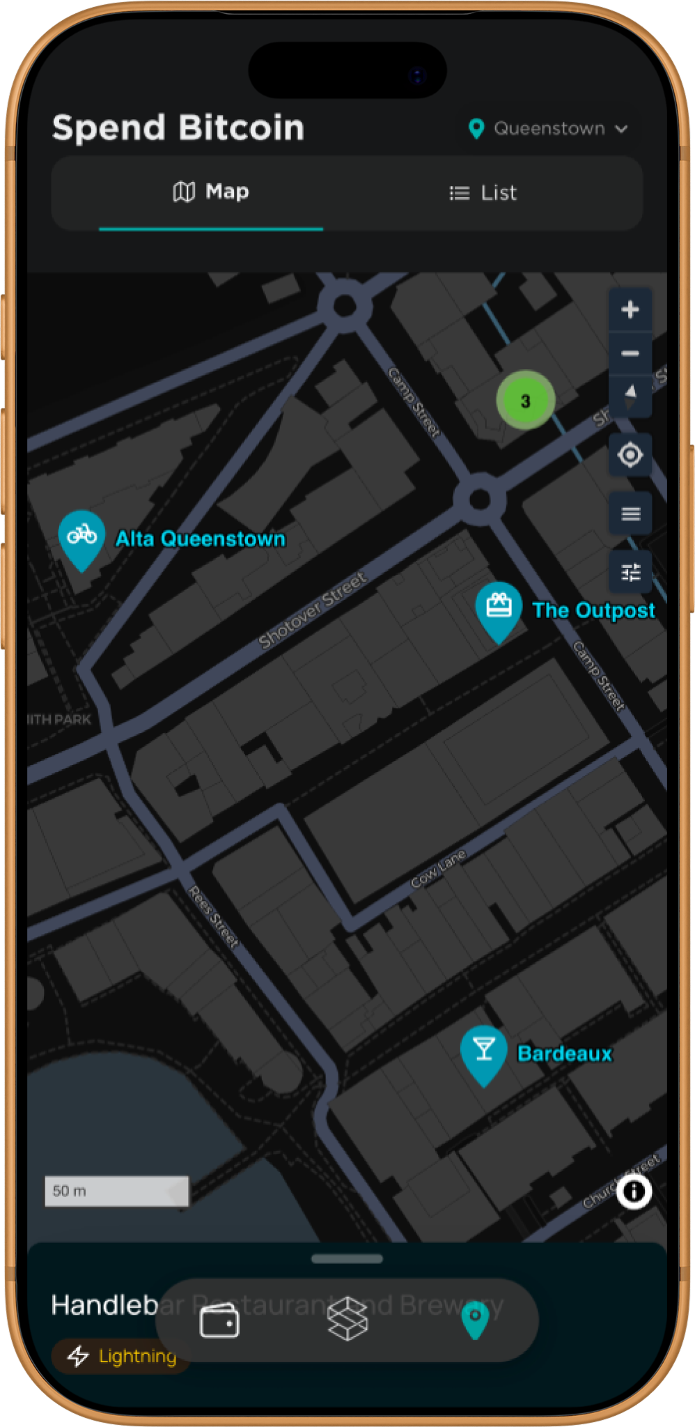 Stacked app Spend Bitcoin map — bitcoin-accepting businesses pinned around central Queenstown